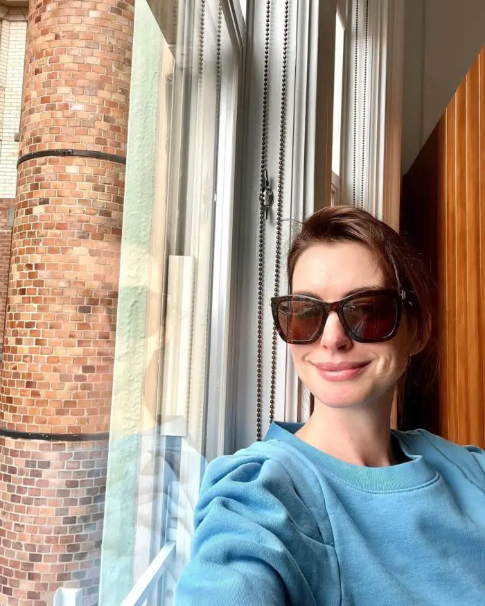 Anne Hathaway with glasses