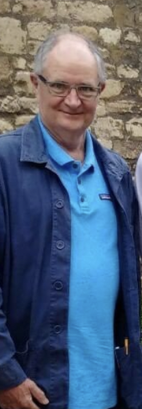 Jim Broadbent wearing glasses